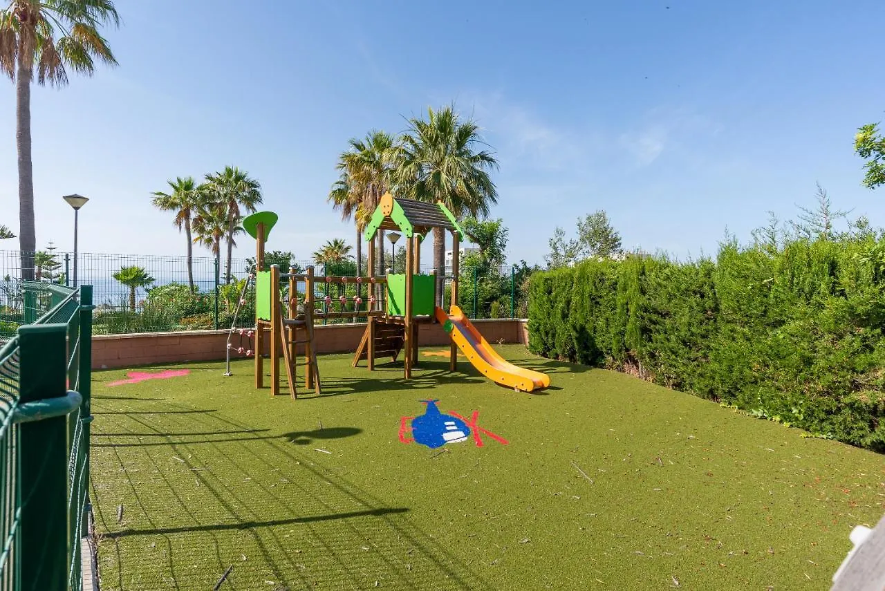 Apartamento Duplex de lujo en la playa , jacuzzy, piscina, chimenea y padel Benalmádena España